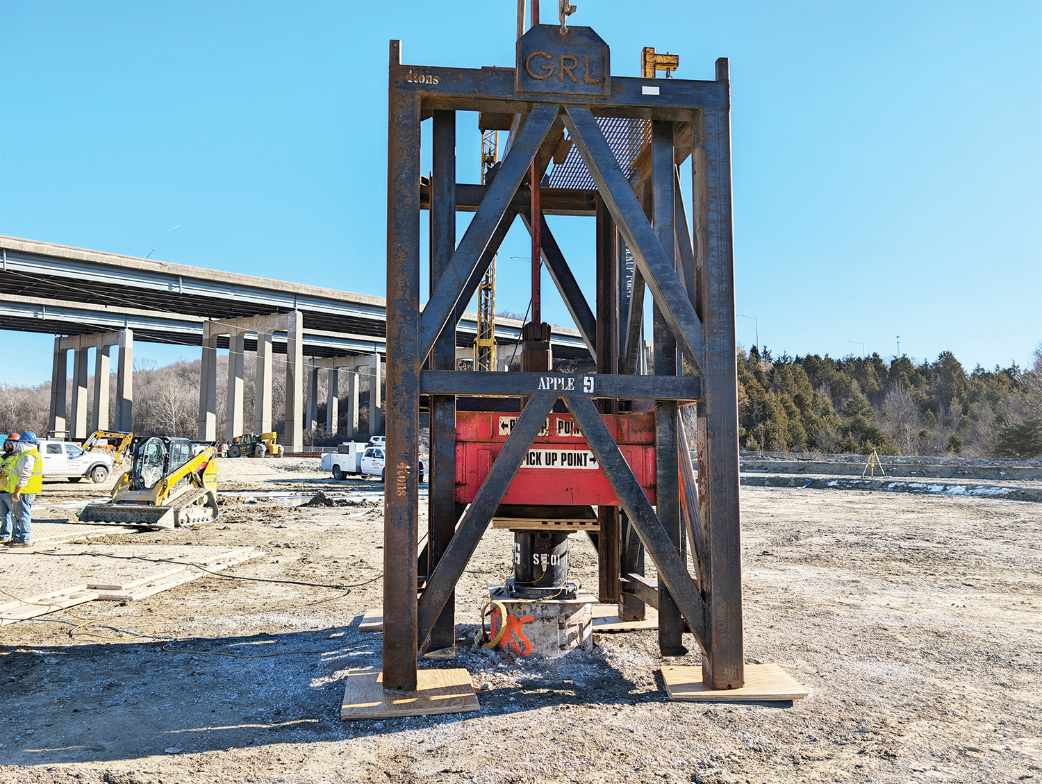 High-strain dynamic testing measures the response of a deep foundation to an impact and can be used to estimate mobilized axial resistance. Unlike a conventional static load test, the estimate of static resistance is derived through analysis of dynamic measurements. Photo Credit: GRL Engineers